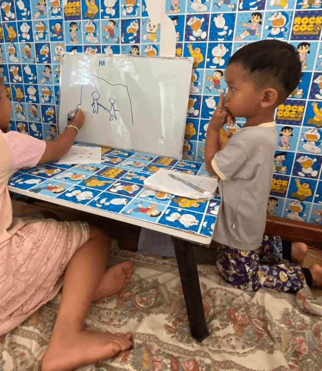 The whisper trick feels like a shared secret. It instantly calms the energy when an older sibling is trying to concentrate.