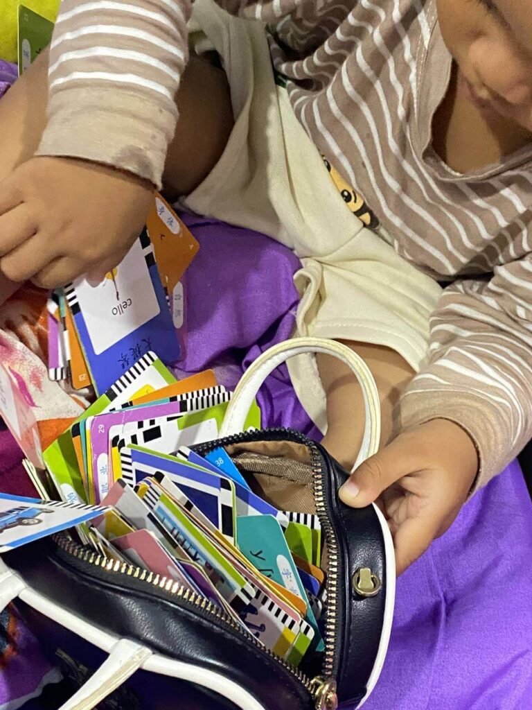 "When you finish putting the flashcards away, then we can go..." Framing cleanup as the first step of a fun plan guarantees cooperation.